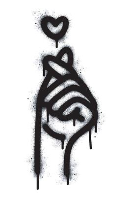 Spray Painted Graffiti Korean heart sign Sprayed isolated on white background. graffiti Finger love symbol with overspray in black on white. Sign of affection