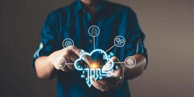 man using cloud computing diagram show on hand.Data storage.the use of online digital network technology in business, buying and selling commerce online digital marketplace photo