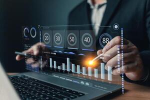 Business online digital market. businessman use graph report and progress of business and analyze financial,and investment. Use technology to plan strategy to success goal and growth stock photo