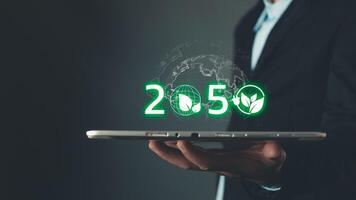 ESG for Environment Social and Governance,net zero 2050,human are raising the planet to save energy,and reduce global warming,idea for environment conscious business,reducing greenhouse gas emissions. photo