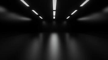 A dark hallway with recessed ceiling lights casts a reflective glow on the smooth floor below photo