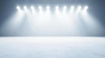 Bright stage lighting illuminates a textured floor, creating a dramatic and inviting atmosphere photo