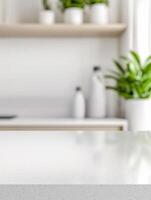 Clean white countertop in a bright, minimalist kitchen. photo