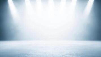 A brightly lit stage with a pale surface underneath bright spotlights, ready for performance photo