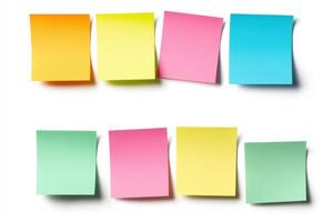 Collection of vibrant, blank sticky notes in various colors arranged in a grid pattern photo