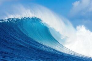 Majestic ocean wave curls under a bright blue sky, embodying power, energy, and natural beauty photo