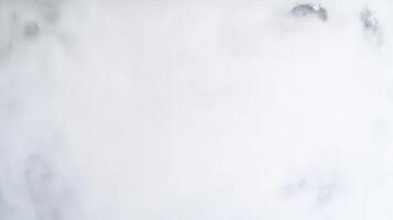 Abstract textured background with soft, subtle gray and white hues blending seamlessly. Artistic backdrop photo