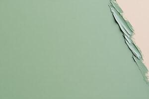 Textured background with abstract green paint strokes on canvas, creating an artistic pattern photo
