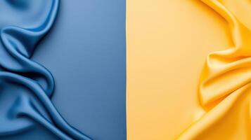 Two-toned backdrop featuring rippled, draped fabric in elegant blue and bright yellow hues. photo