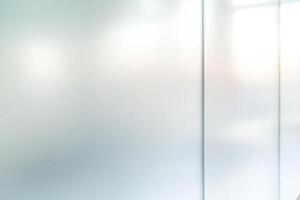 Abstract frosted glass panel with vertical lines creating a modern, minimalist aesthetic photo