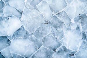 Cracked Ice, An overhead shot reveals fractured, translucent sheets in a mosaic of frozen textures photo