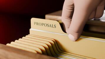 Searching Documents File of PROPOSALS in Drawer in Dark Room Opening Drawer and Highlighting Label Text video