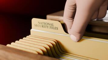Searching Documents File of NATIONAL SECURITY FILES in Drawer in Dark Room Opening Drawer and Highlighting Label Text video