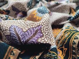 a close up of a colorful fabric with pattern photo