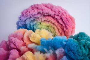 A rainbow colored cloud of smoke is shown photo
