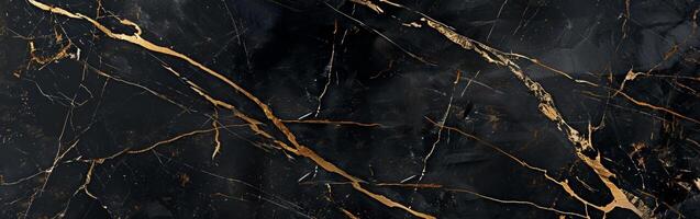 Black marble surface features striking golden veins, highlighting the exquisite natural patterns and luxurious appeal of the material photo