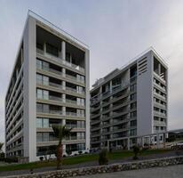Modern architecture in a tranquil setting with striking minimalist design and lush landscaping photo