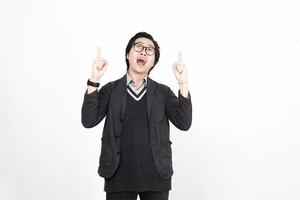 A man in glasses and a sweater is pointing up photo