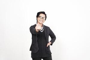 A man in glasses and a sweater is pointing at something photo