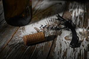 Uncorking memories over a rustic wooden table in warm evening light photo