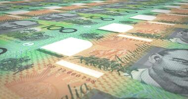 Banknotes of one hundred australian dollars rolling on screen, loop video