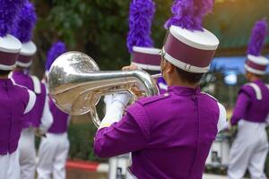 The tuba that the orchestral students play while walking in the parade. Soft and selective focus. photo