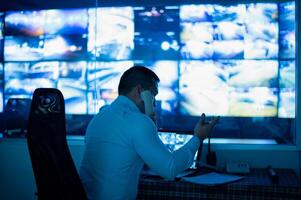 CCTV officers are calling to report the situation on multiple monitors photo