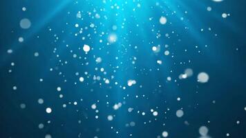 abstract blue background with bubbles,Glowing Particles in a Dreamy Blue Atmosphere , video