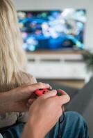 Hands using game controller. Playing games photo