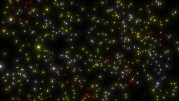 Chaotically swaying multi-colored luminous particles on a black background. Abstract animation. video