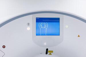 MRI machine with close-up of control panel and adjustment buttons, enabling high-precision diagnostics and maximum efficiency. Concept of innovative medical technologies. Banner, white background, ads photo