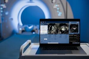Computed tomography scan mock-up with multiple windows and data. Medical research environment software with CT scan results for computer displays and laptop screens. Banner, advertising medicine photo