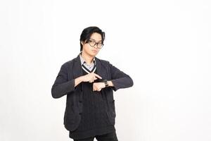 A man in glasses and a sweater is making a gesture photo