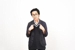 A man in glasses and a sweater standing in front of a white background photo