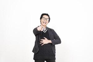 A man in glasses and a sweater pointing at something photo