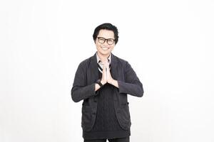 A man in glasses and a sweater is smiling photo