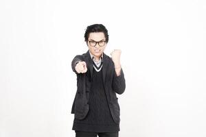 A man in glasses and a sweater pointing at something photo