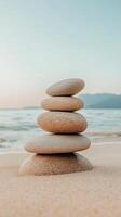 Stack of stones on the beach photo