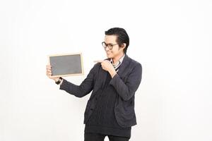 A man holding a chalkboard and pointing to it photo