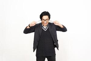 A man in glasses and a sweater is making a funny face photo