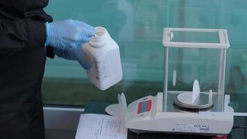 Scientist Weighing Substance on Laboratory Scale video