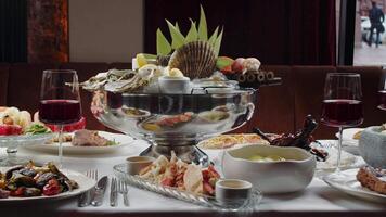 Luxurious seafood platter with wine in a fine dining restaurant video