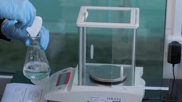 Scientist Using Pipette to Transfer Liquid in Laboratory video