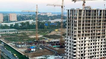 A view of a construction site with a lot of cranes video