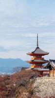 Pagoda at Kiyomizu temple time lapse vertical in autumn season on a cloudy day. video