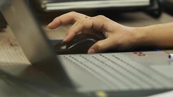 Hands of an businessman in expensive clothes work at computers in the office. video