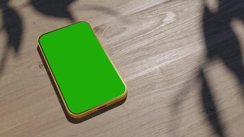 A phone lying on a table an animation of a gadget on a wooden table video