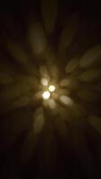 Defocused golden bokeh lights vertical background. This elegant motion background animation with hexagonal lens blur bokeh particles is full HD and a seamless loop. video