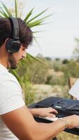 Man Pianist Plays The Keyboard In An Outdoor Garden For A Private Party video
