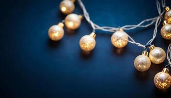 Festive Christmas Garland with Sparkling Bokeh Lights on Dark Blue Background. Perfect for Holiday photo